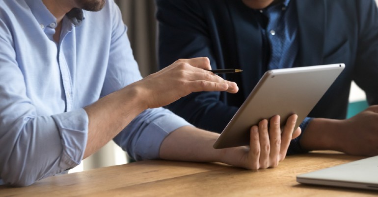 Connected Tech Use is at an All-Time High-Along with Consumer Frustrations Hero Person helping another person using tablet