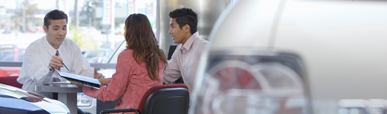 Dealer Sales Couple buying a car
