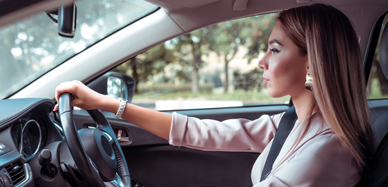 a woman driving a car