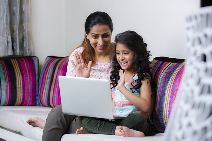 Mom and daughter on laptop